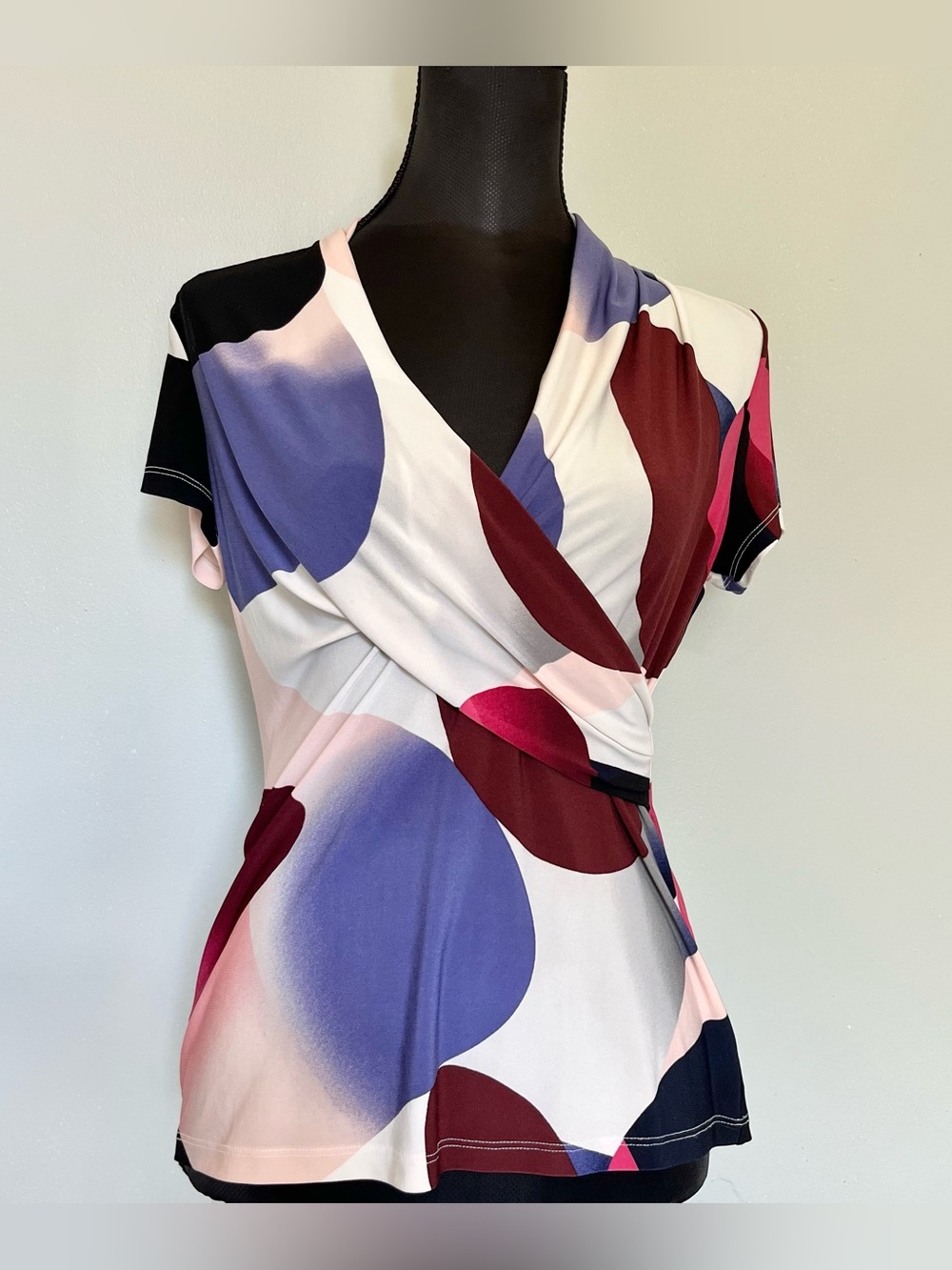 Y2k abstract print wrap top with flowy neckline